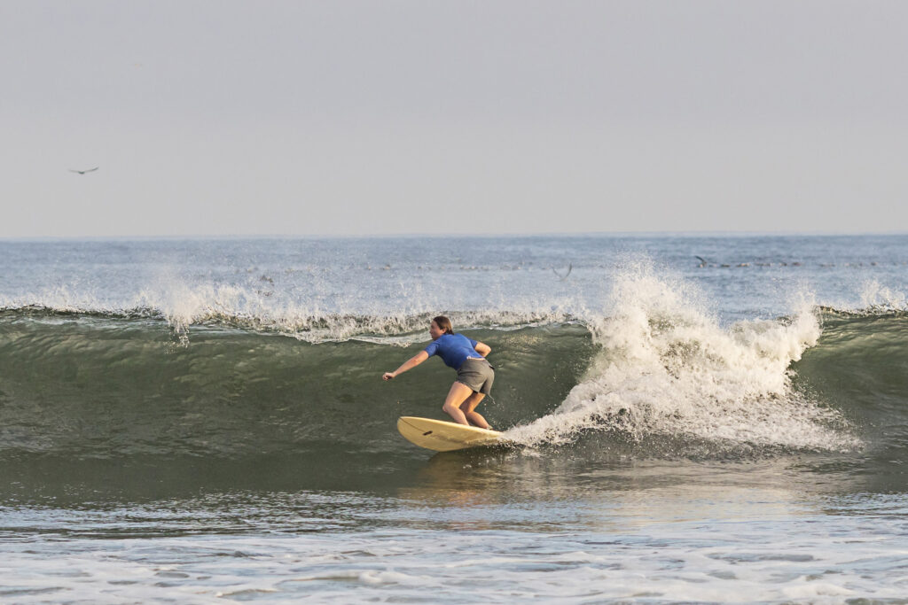 female-surfing