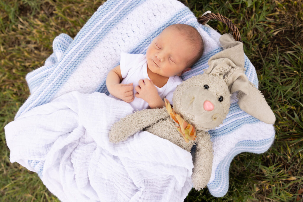 newborn-in-basket-outside