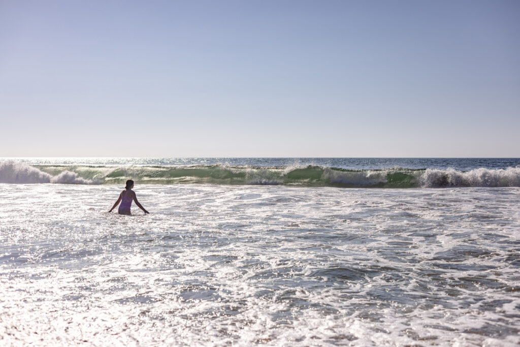 Sayulita beach wave hopping.