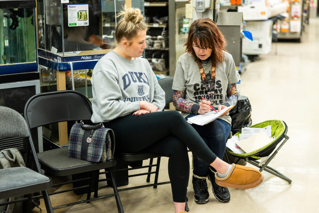 Natalie Young founder of Cattails cat rescue at Manhattan KS Petco adoption event