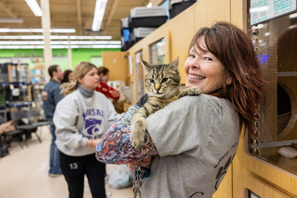 Natalie Young founder of Cattails cat rescue at Manhattan KS Petco adoption event