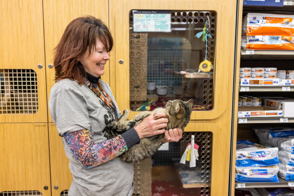 Cat whisperer Natalie Young at adoption event in Manhattan Kansas