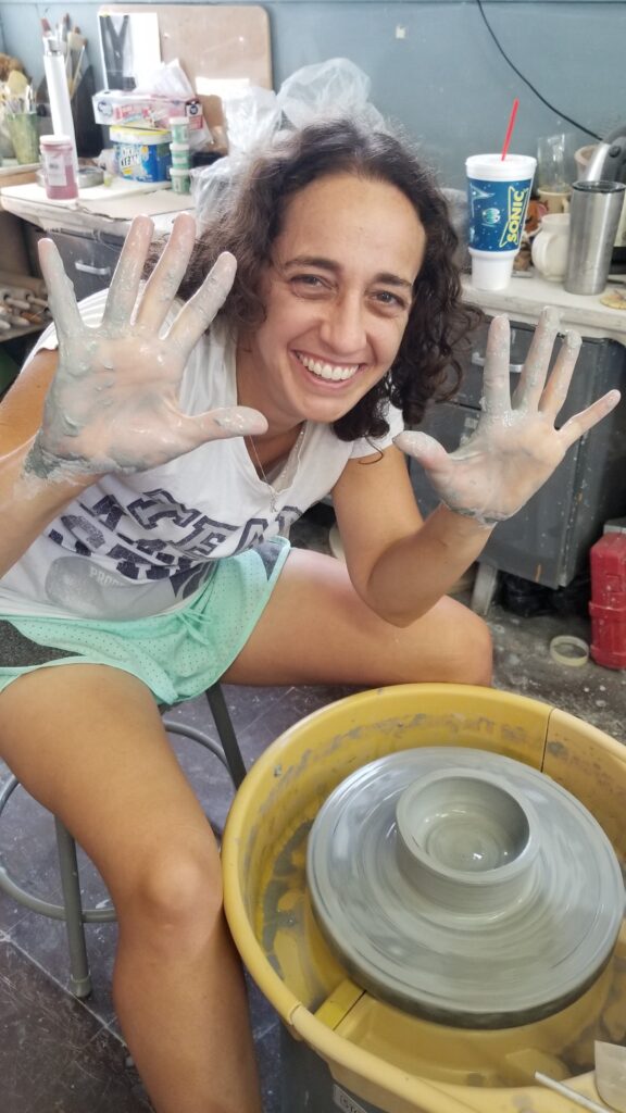 Tammy Karin working at pottery wheel