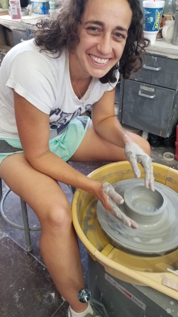 Tammy Karin working on pottery wheel
