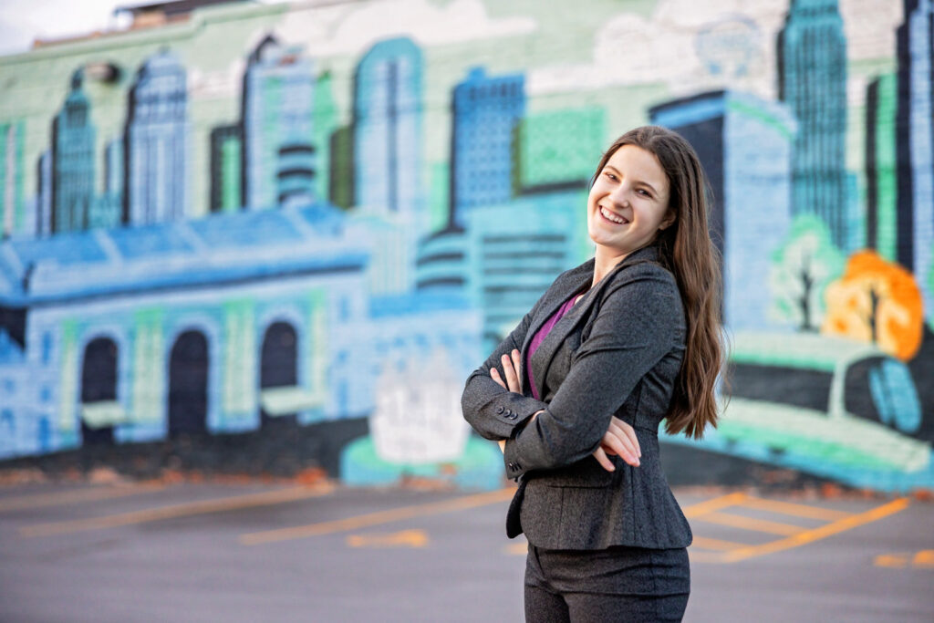 Fun branding photo with iconic Kansas City mural.