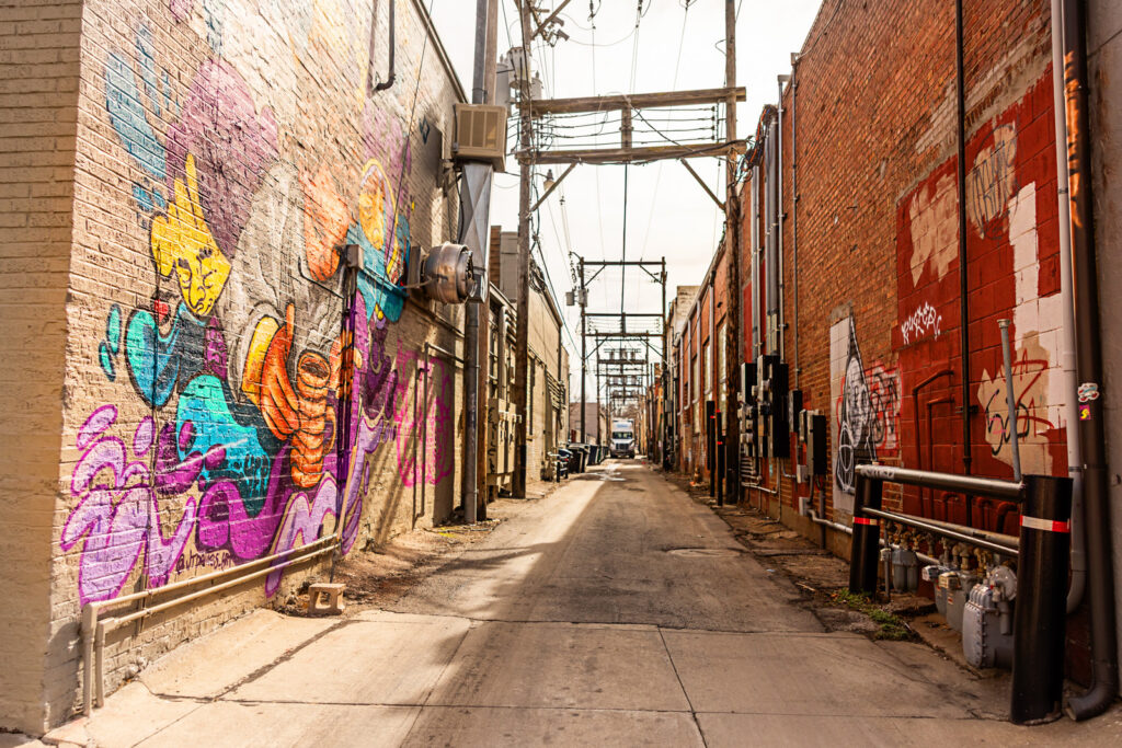 A high end and editorial look in the art covered alleys of North Mass Street.