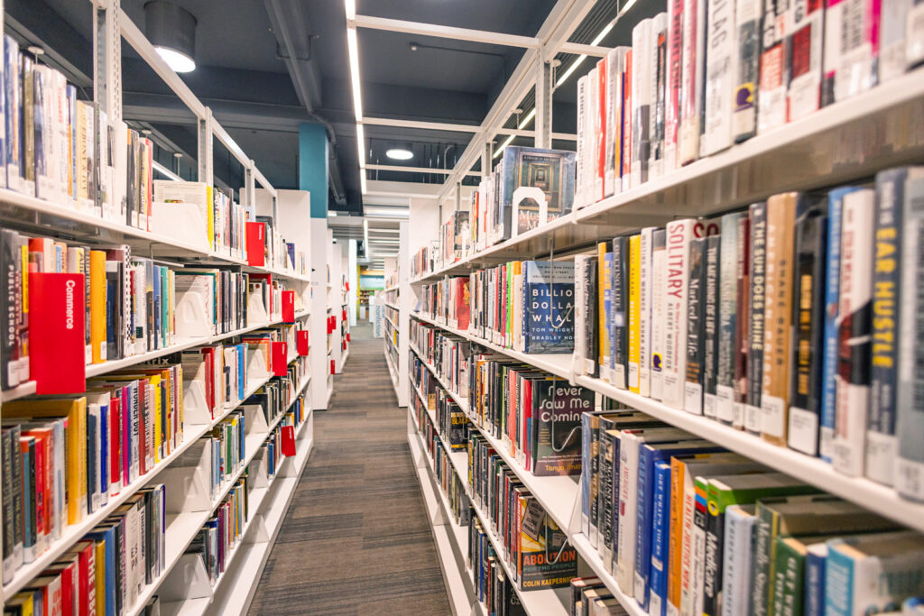 Floor to ceiling books make a great backdrop for your family photos.