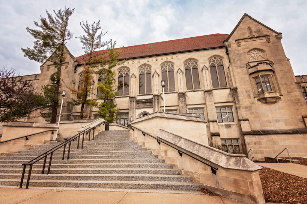 I love the historic stone textures on the KU campus for timeless portraits.