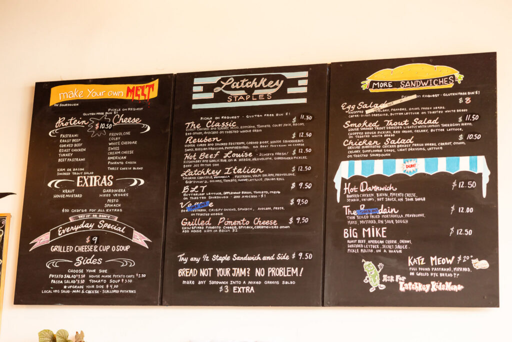 Wall menu at Latchkey Deli in Lawrence, KS.