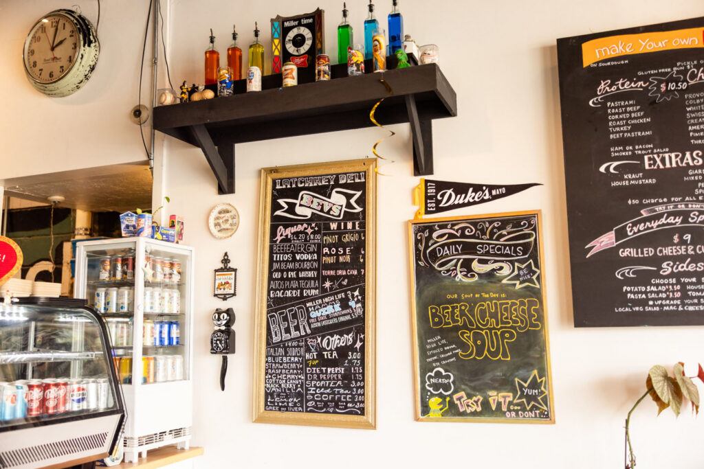 Daily deli specials and drink menu at Latchkey Deli.