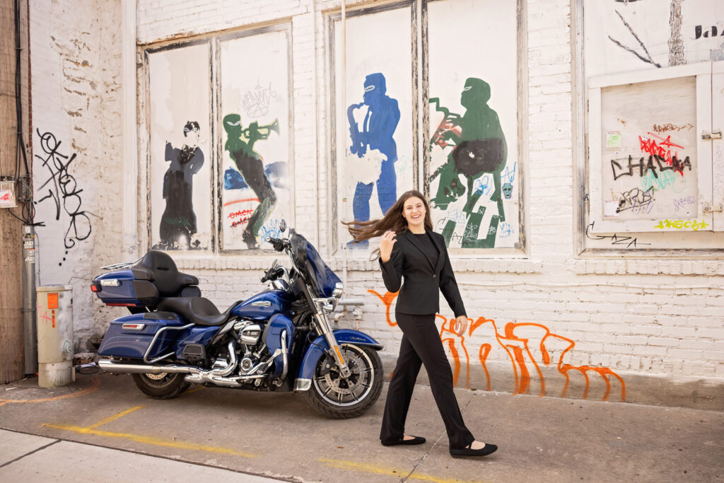 Using colorful murals as a modern backdrop for lifestyle photography in Lawrence.
